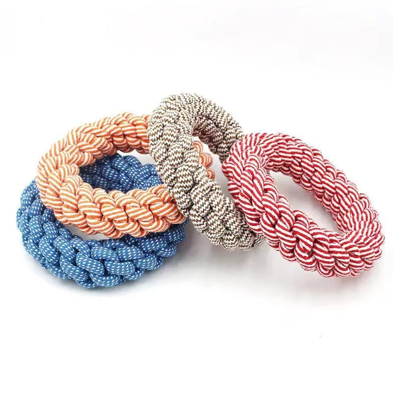Cotton braided ring dog chew toy showing textured woven surface and approximate 18cm diameter