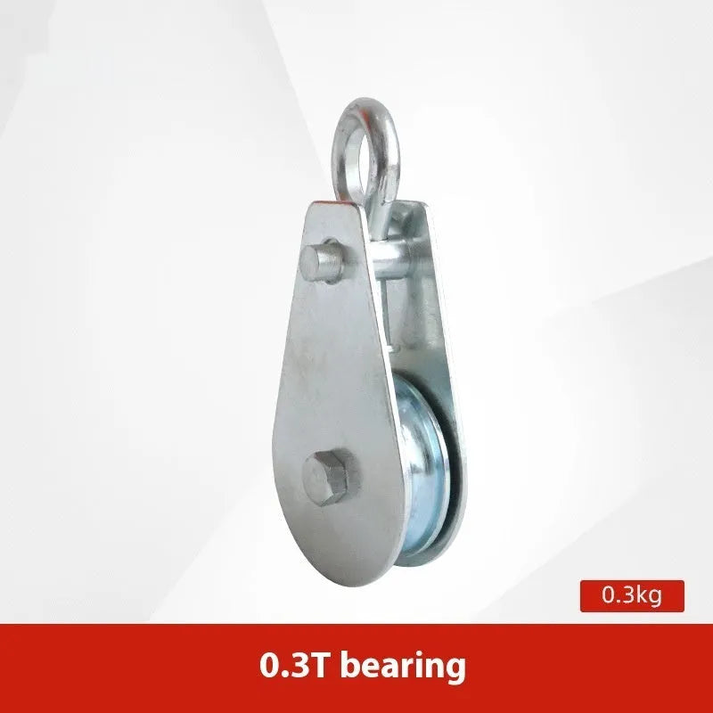 Red industrial steel lifting pulley with a safety latch on the hook for secure lifting.