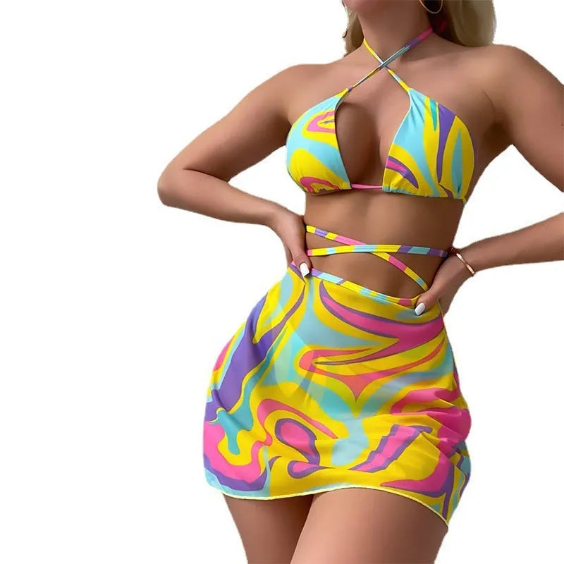Yellow striped halter-neck swimsuit set for women with lace-up back, skirt, and shorts