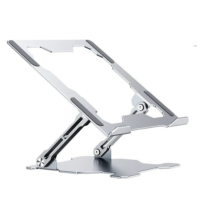 Grey aluminium folding laptop stand shown at an adjustable angle on a wooden desk.