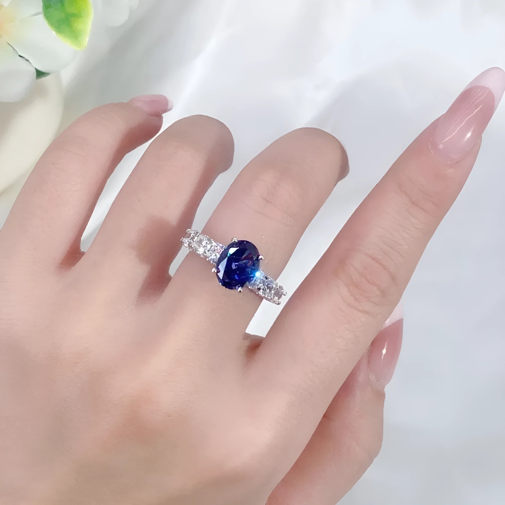 Heart-shaped sterling silver ring with a diamond ice flower cut Tan Sang colour zircon stone.