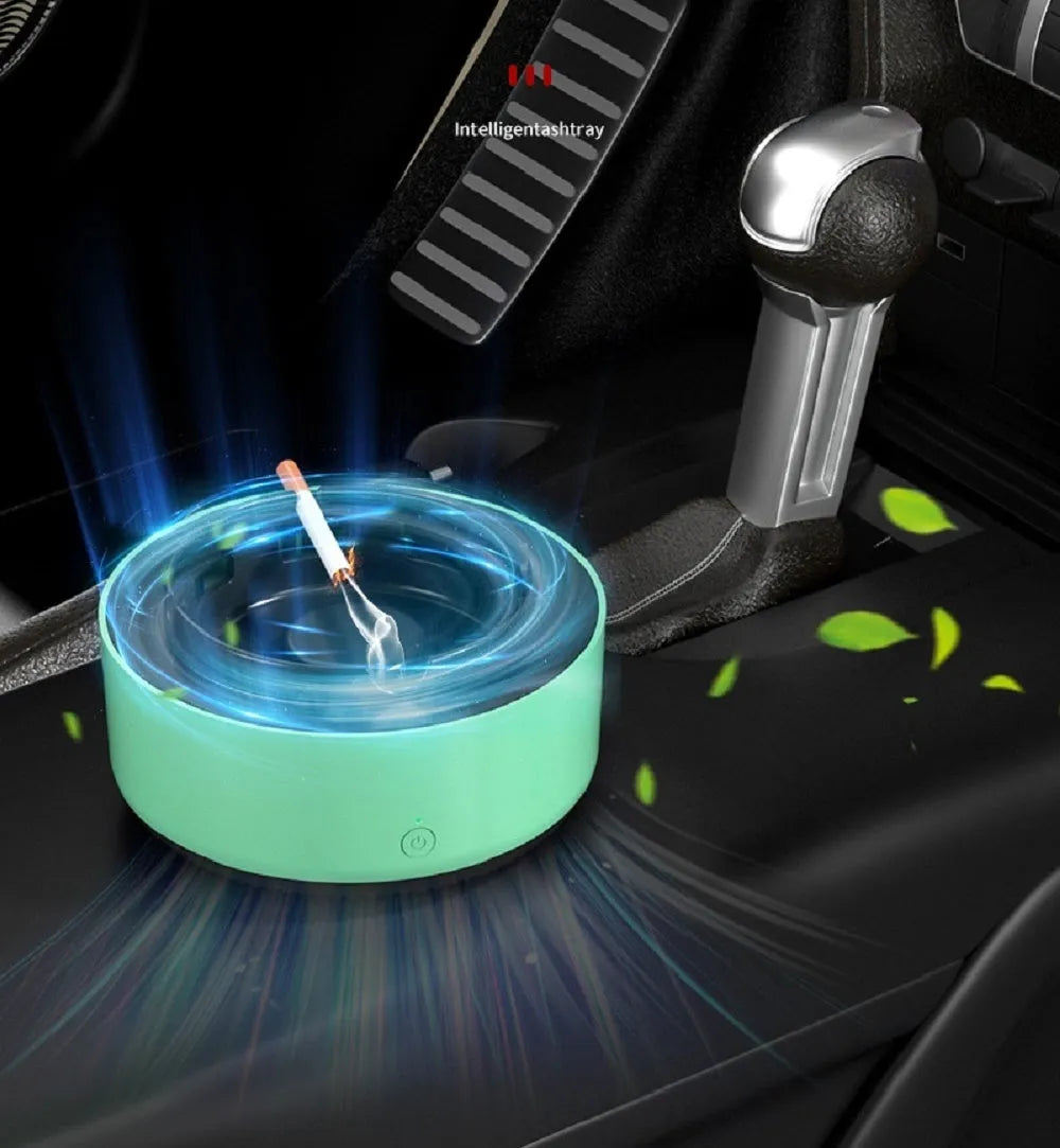 Grey electronic air purifier ashtray with cigarette butt grooves on a table