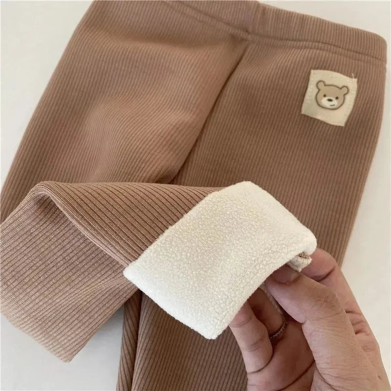 Girls' high-waist fleece-lined winter leggings in beige, black, brown, and grey with a hair band belt.