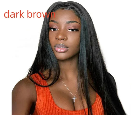 Long straight black synthetic wig with centre-parted fringe on a model