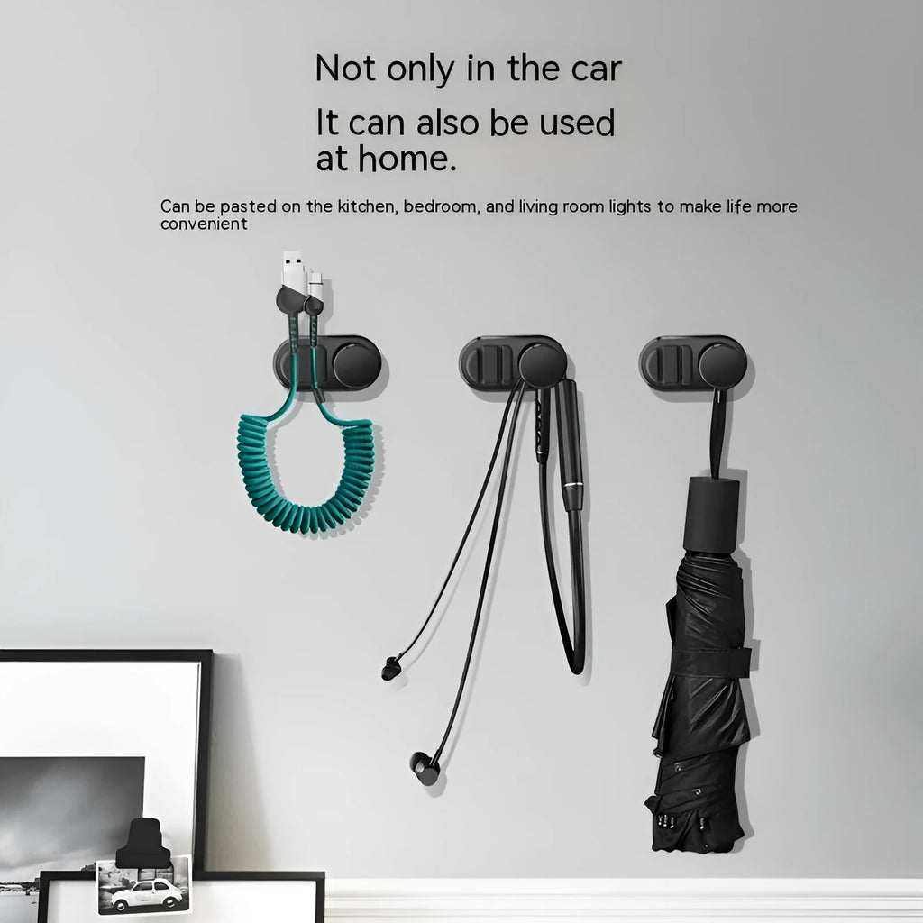 Dark green car data cable storage hook made of ABS silicone showing compact dimensions