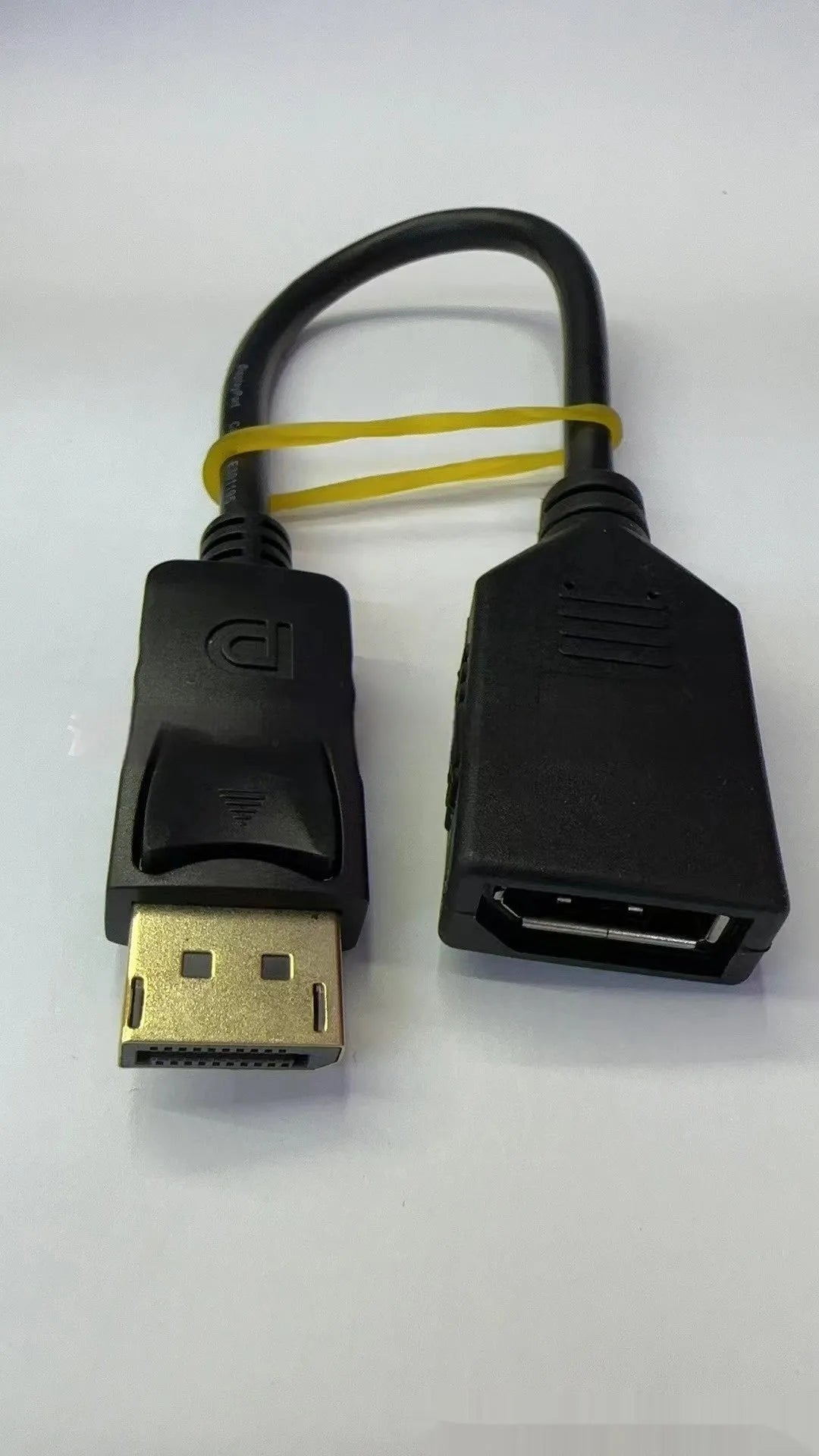 Black Display Port male to female extension cable measuring approximately 10cm in length.