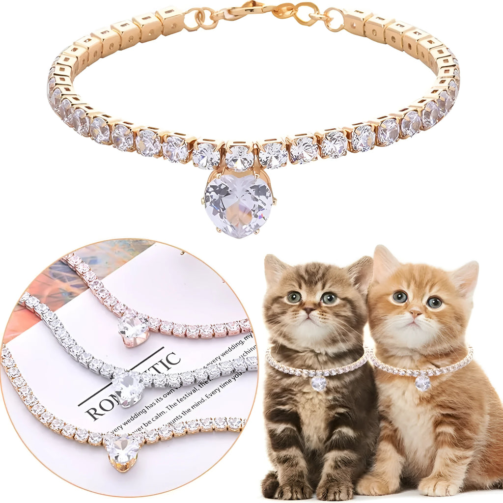 Gold heart-shaped rhinestone collar for dogs and cats on a white background.