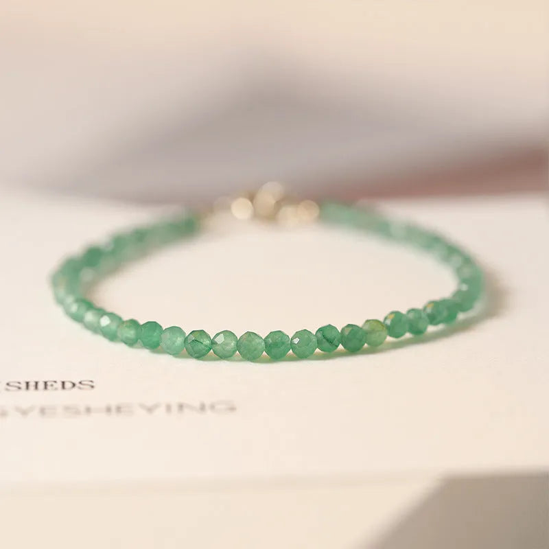 Handmade women's jade bracelet with 3mm beads in green aventurine, shown in 15cm length.