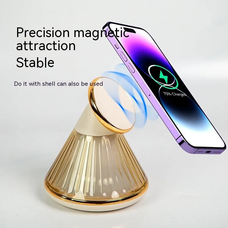 Champagne gold night table lamp with integrated magnetic wireless charging seat on its base.
