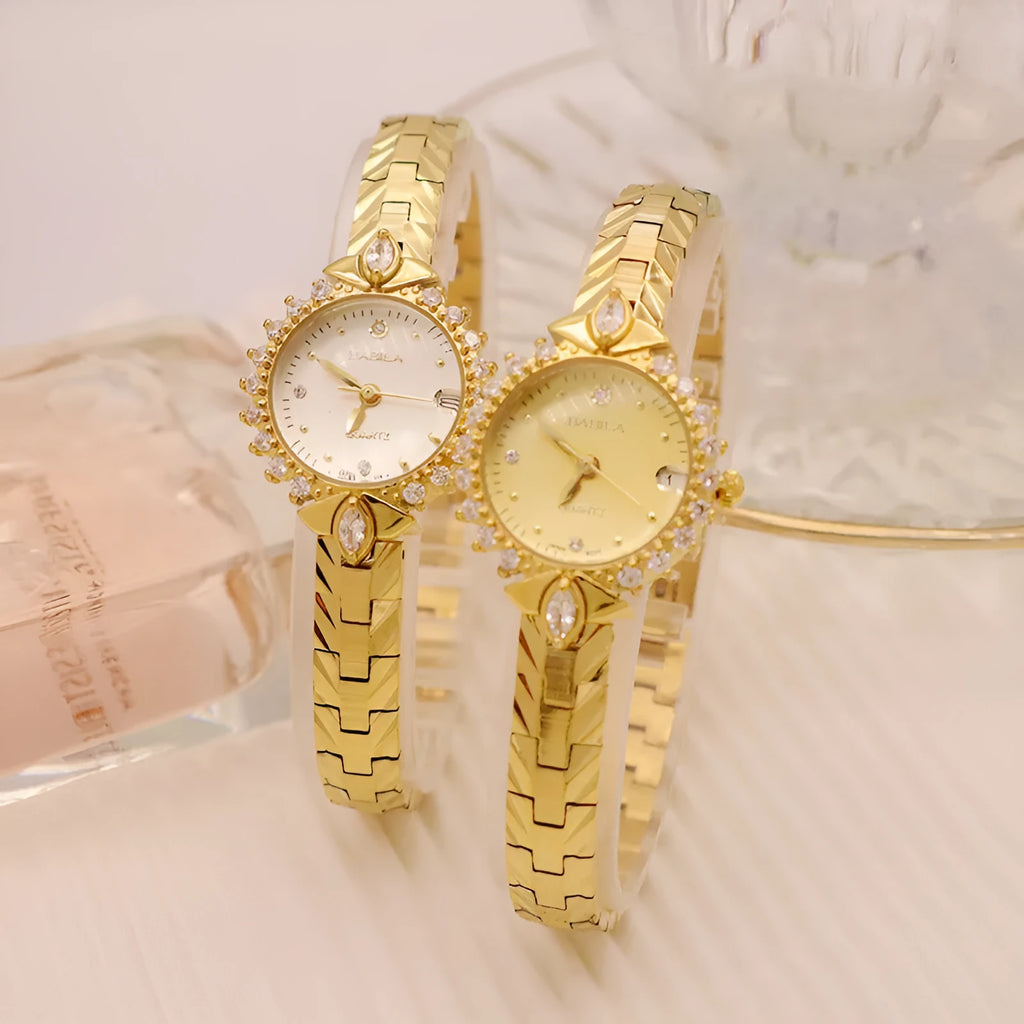 Women's gold vintage style quartz watch with diamond embossed bracelet.