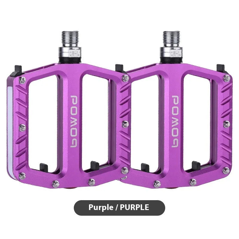 Pair of aluminium alloy bicycle pedals with integrated 710 LED lights in a choice of colours.