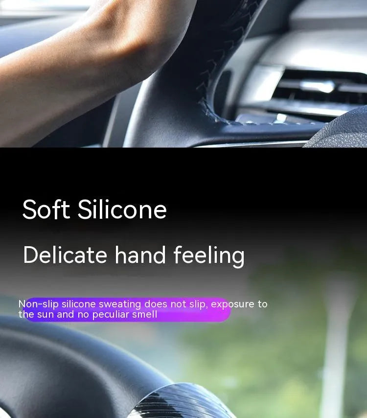 Black silicone steering wheel assist ball for single-handed driving control