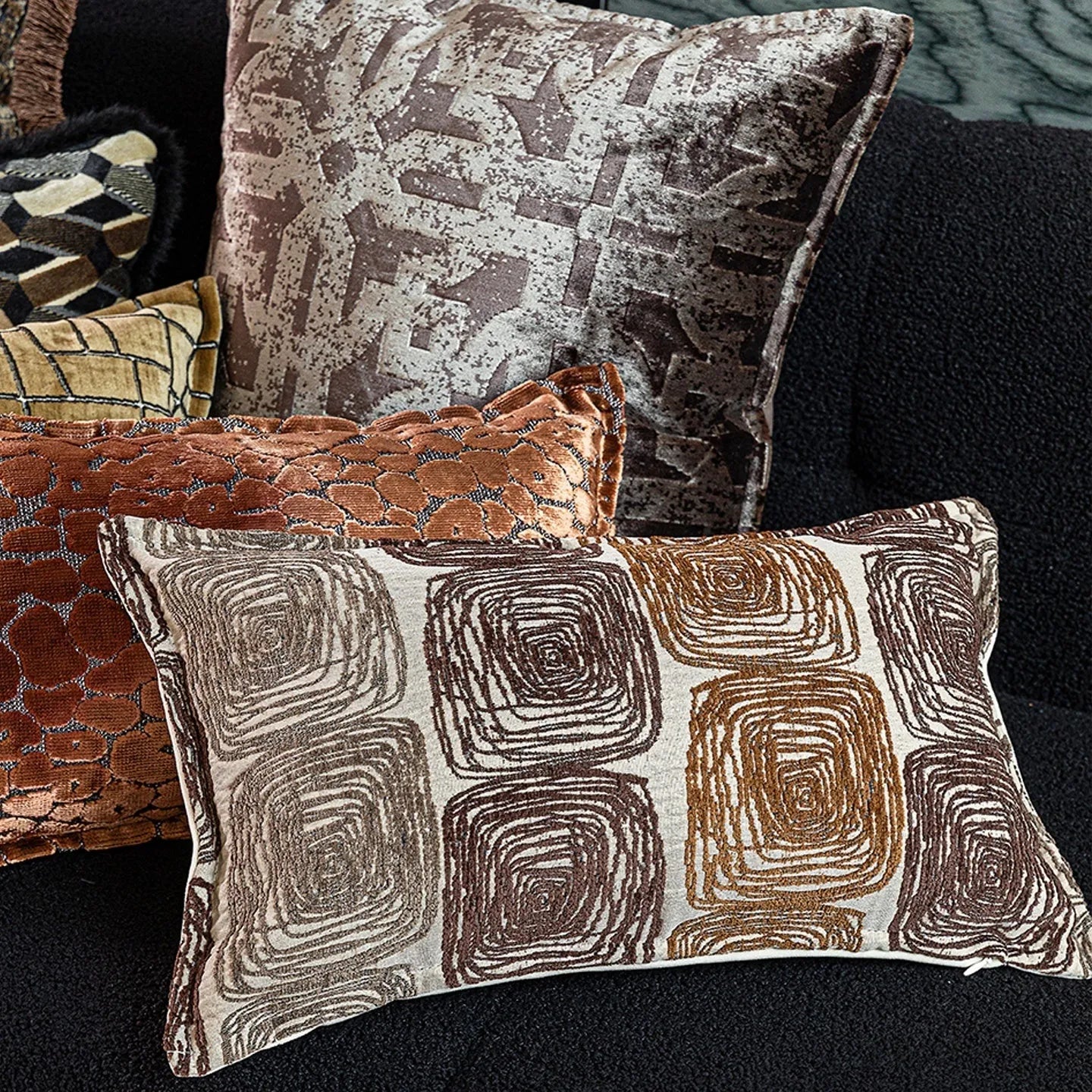 Cream and coffee coloured abstract coil pattern pillow cover in square and lumbar sizes.
