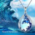 Moonstone blue alloy heart pendant on a women's necklace chain.