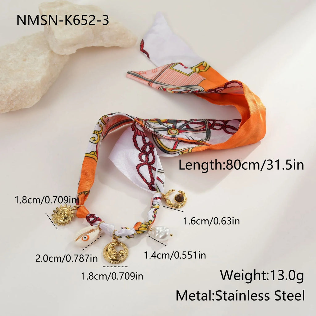 18K gold electroplated stainless steel necklace and bracelet set with adjustable chain on white background