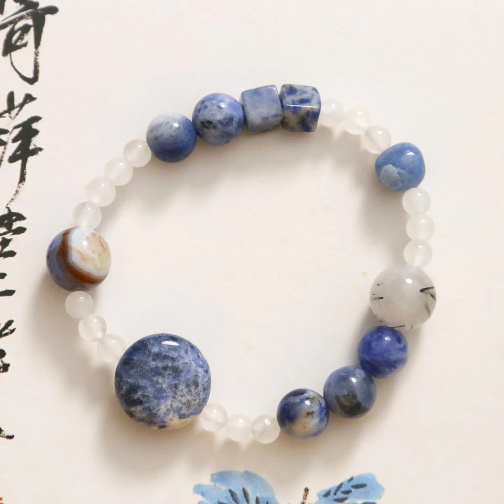 Hand-woven natural stone bracelet with blue point stone and black hair crystal agate beads