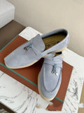 Black high-top slip-on loafers with a round toe and visible sewing line detail on the artificial PU upper.