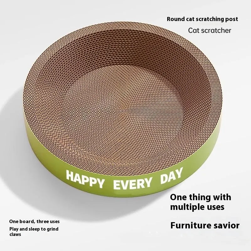 Round green cat scratching board nest bed for indoor pets.