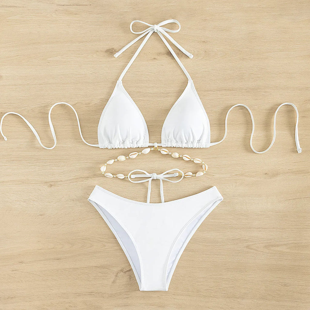 Women's black halter lace-up bikini briefs on a white background.