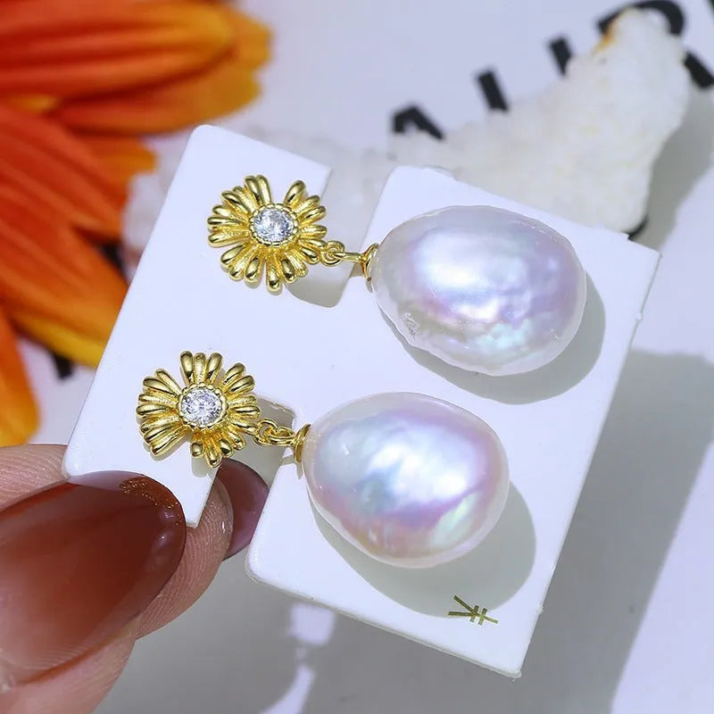 Baroque floral S925 sterling silver drop earrings with an open ring holder frame on the eardrop.