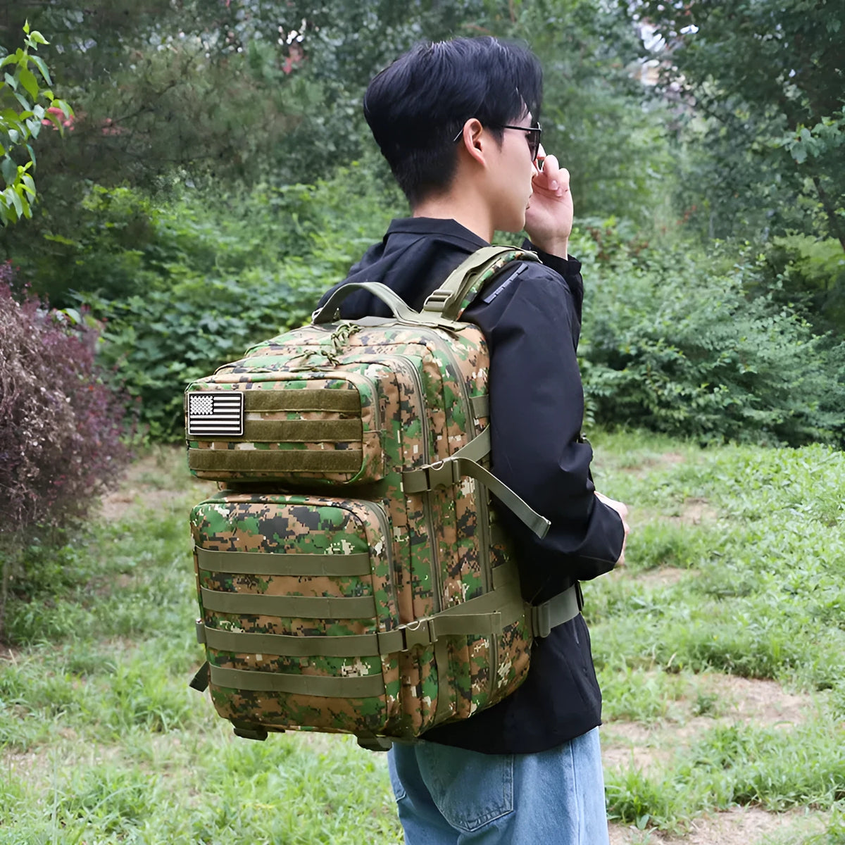 Large capacity waterproof travel backpack in camouflage oxford cloth, 56-75L, 48 x 31 x 31cm, army green and black options.