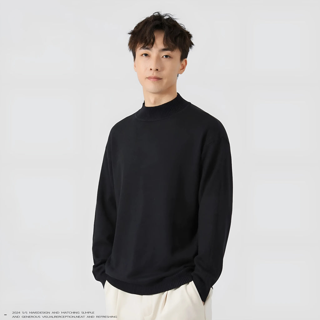 Man wearing a loose-fit army green long-sleeved pullover sweater for casual wear.