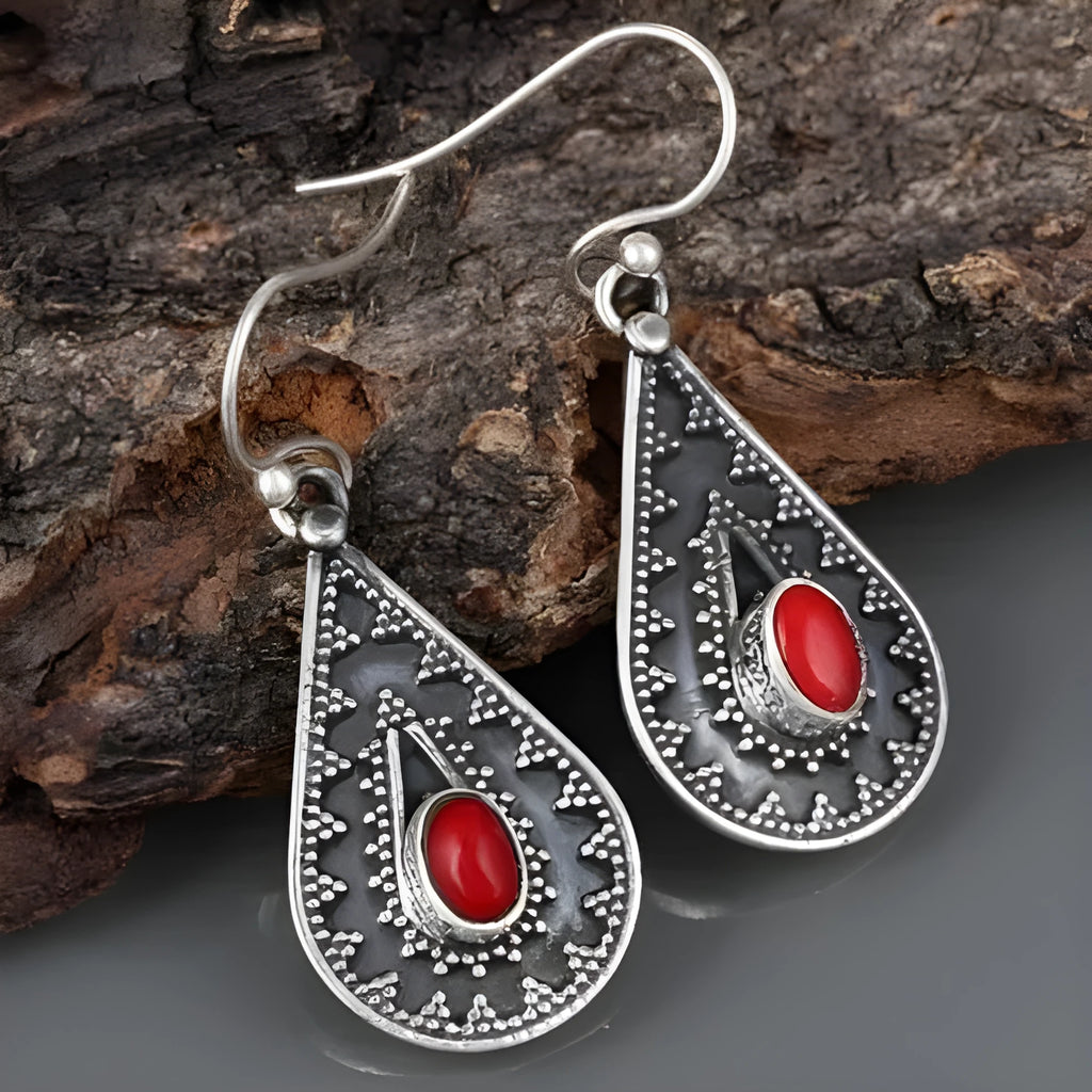 Silver water drop earrings with red pine gemstone accents and retro European American styling