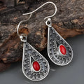 Silver water drop earrings with red pine gemstone accents and retro European American styling