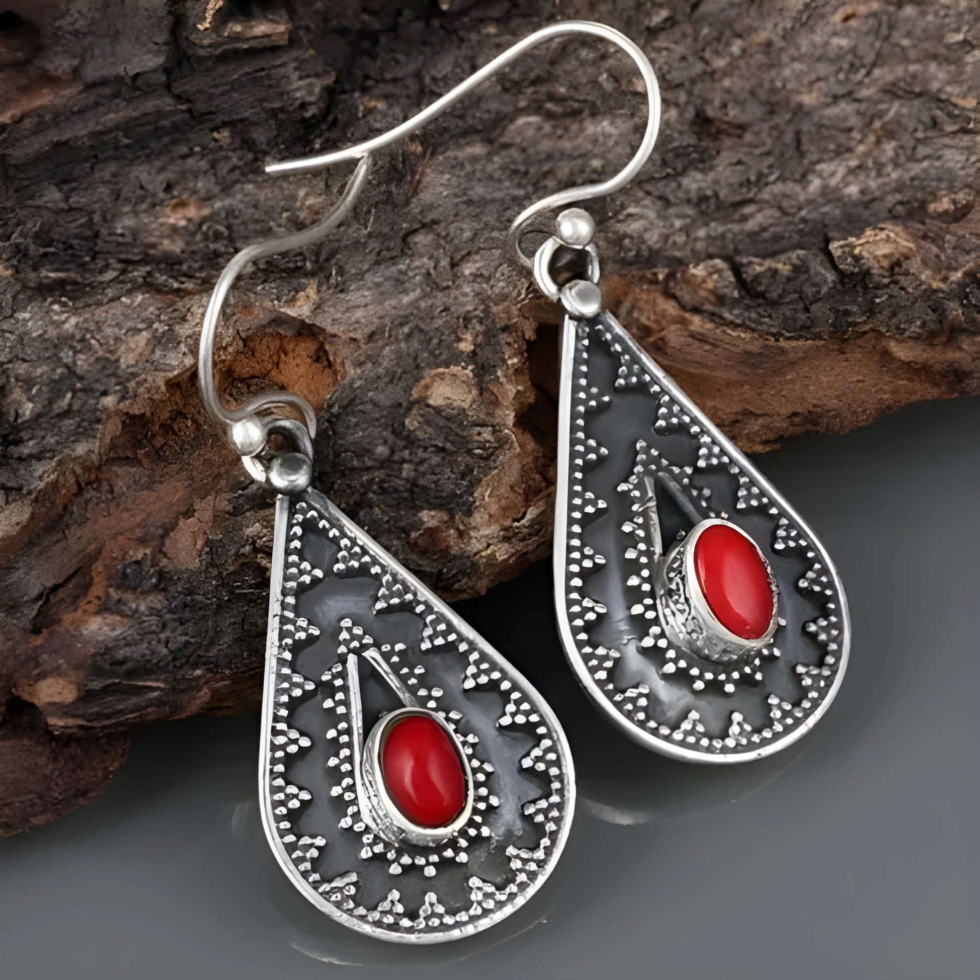 Silver water drop earrings with red pine gemstone accents and retro European American styling