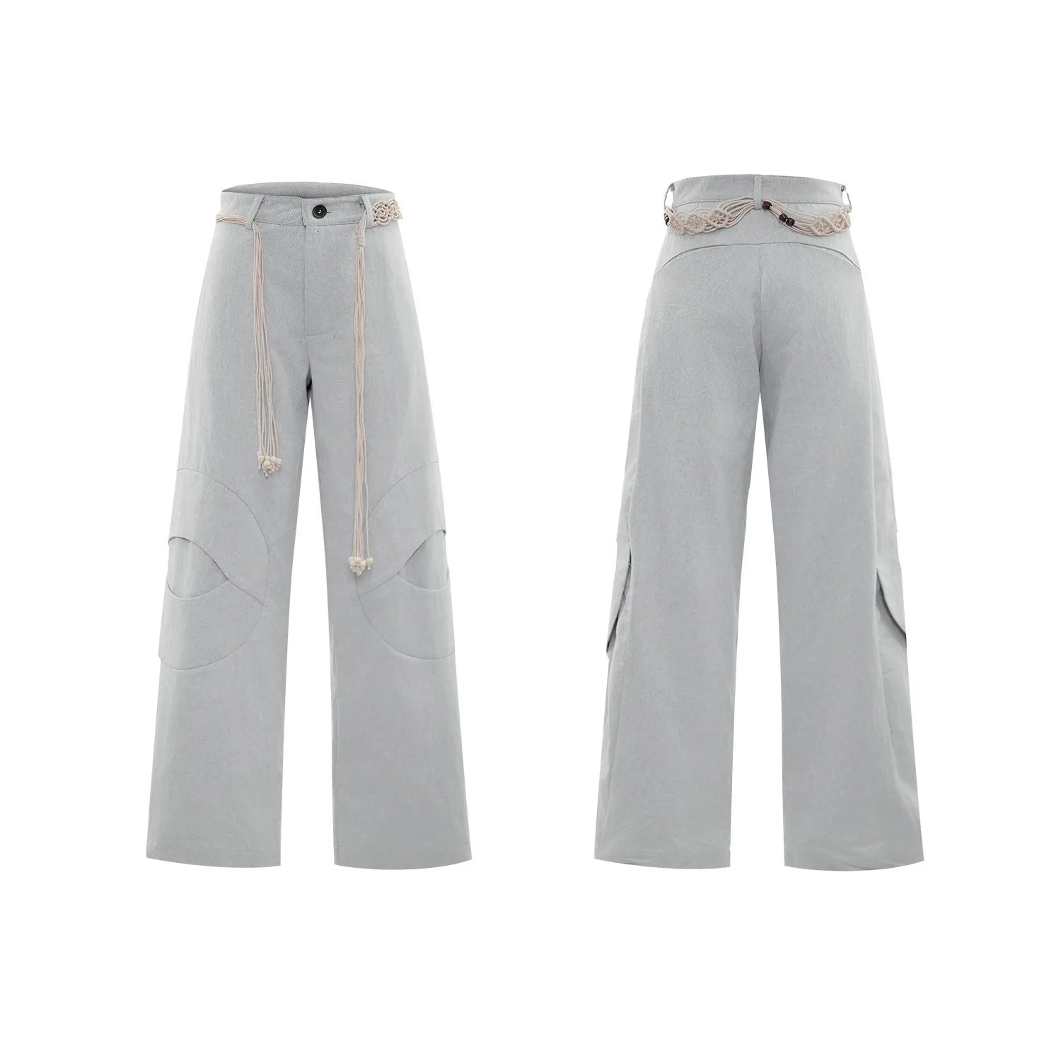 Men's dark blue straight-leg jeans with zipper decorations and tassel details on a loose cotton fit.
