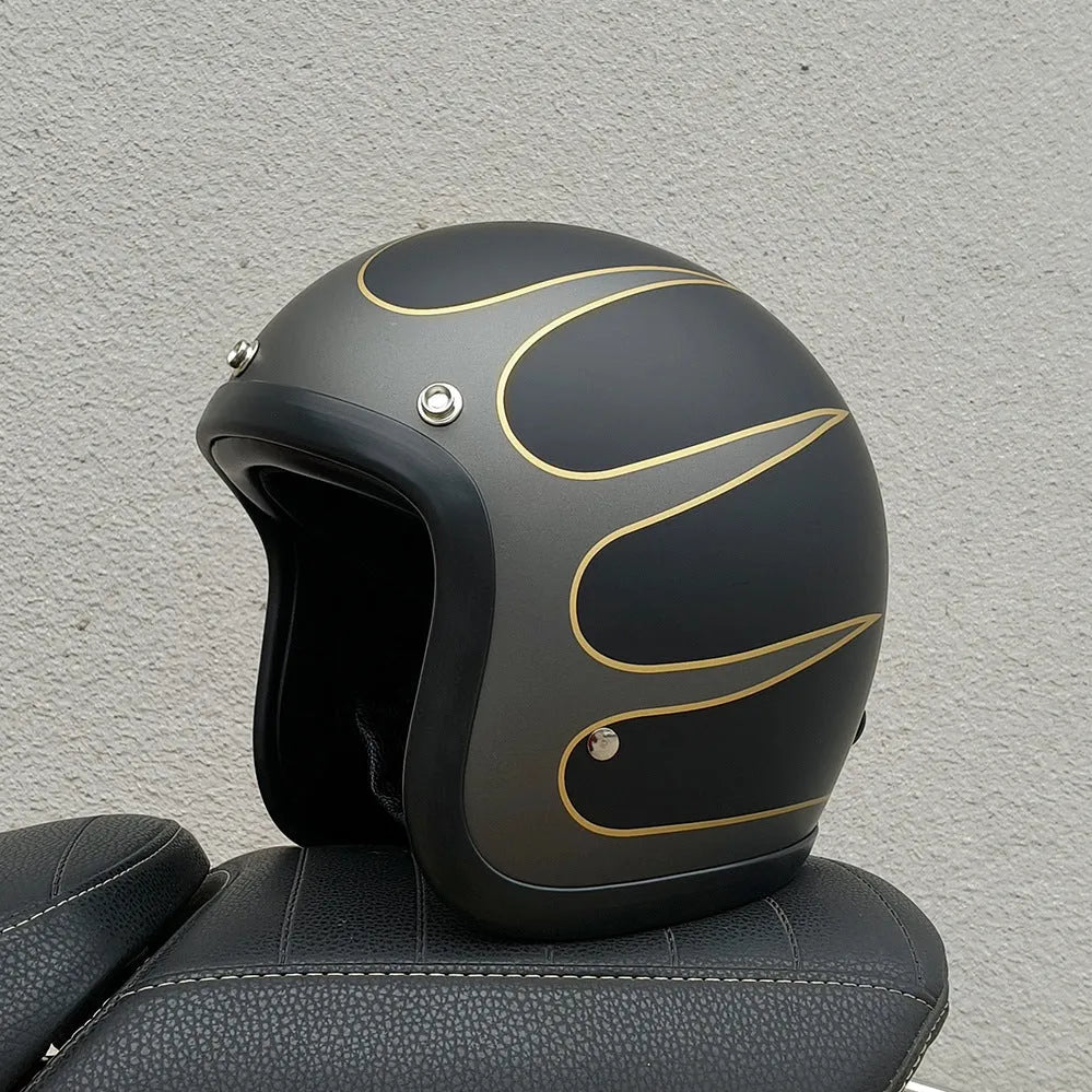 Retro-style open-face motorcycle half helmet in cement grey with a glossy FRP shell and quick-release chin strap.