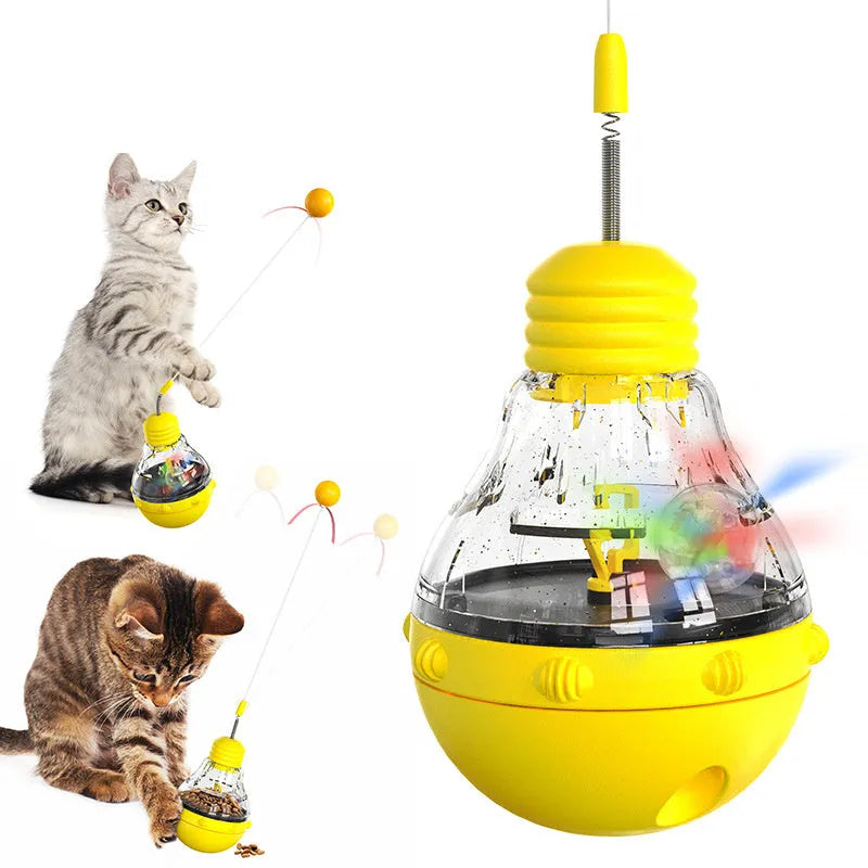 Interactive cat wand toy with rocking base, teaser stick, and built-in food dispenser in yellow.