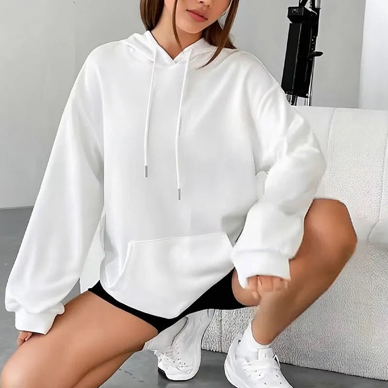 Women's loose grey drawstring hoodie with front kangaroo pockets, on a hanger.