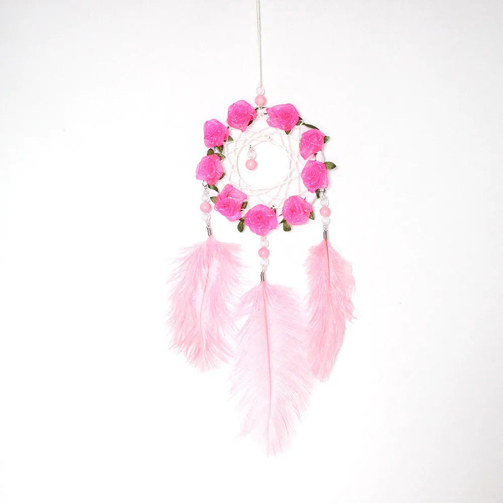 Pink ostrich feather dreamcatcher wind chime ornament measuring 10cm for wall decoration