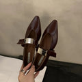 Women's black microfiber Mary Jane shoes with silver pointed toe detail and buckle fastening