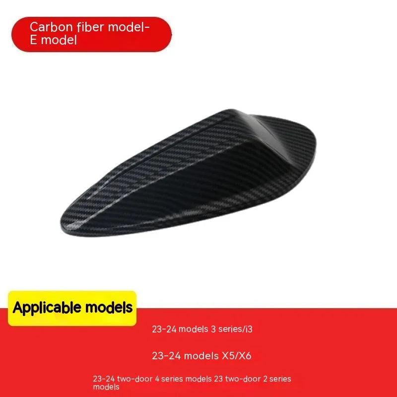 BMW shark fin antenna cover in carbon drill pattern and piano black finishes for Type A, B, and E models.