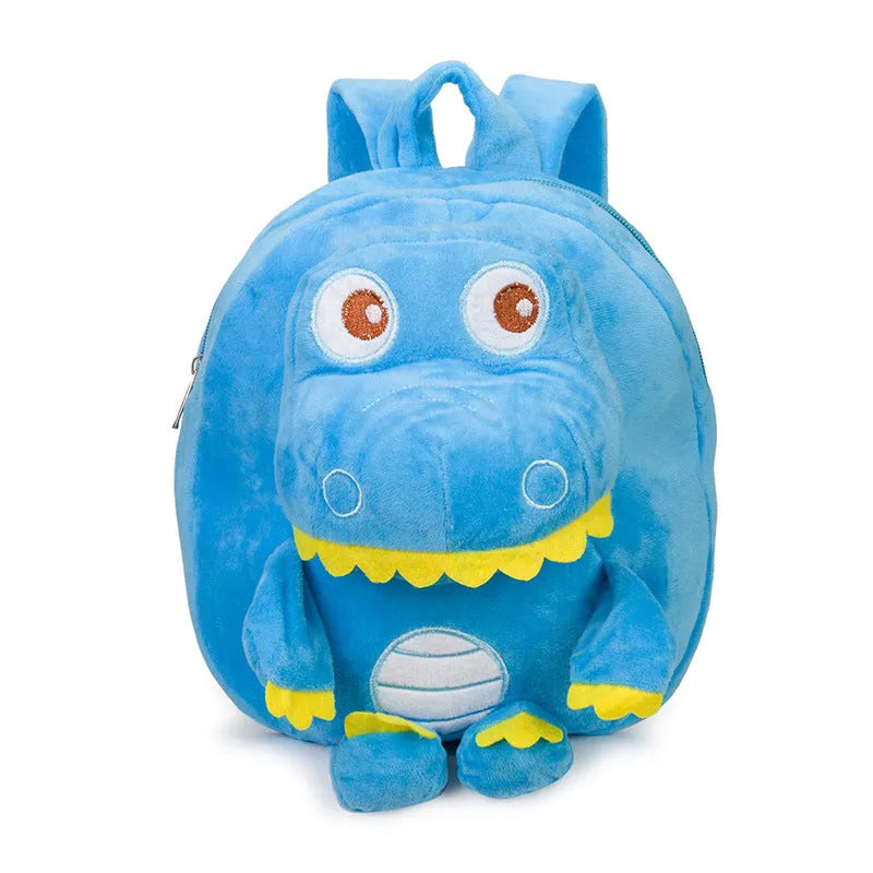 Soft blue plush children's backpack with an embroidered dinosaur character and a soft handle.