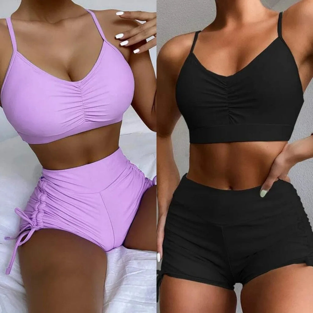 Purple high-waisted split bikini swimsuit for women on a mannequin.