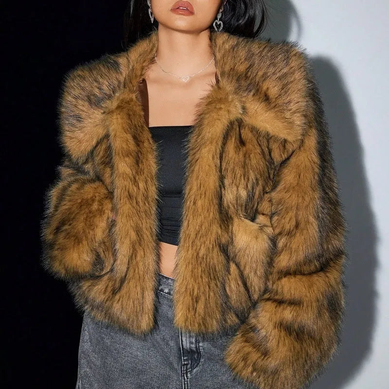 Women's short black and white artificial fur coat with a large fur collar, shown in a cute style pose.