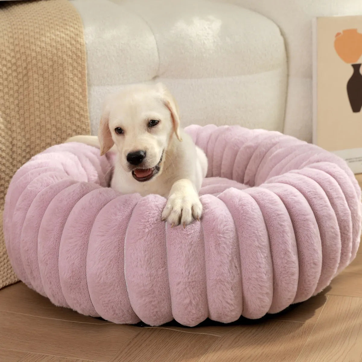 Round plush pet bed with long-hair rabbit fur style texture in beige colour