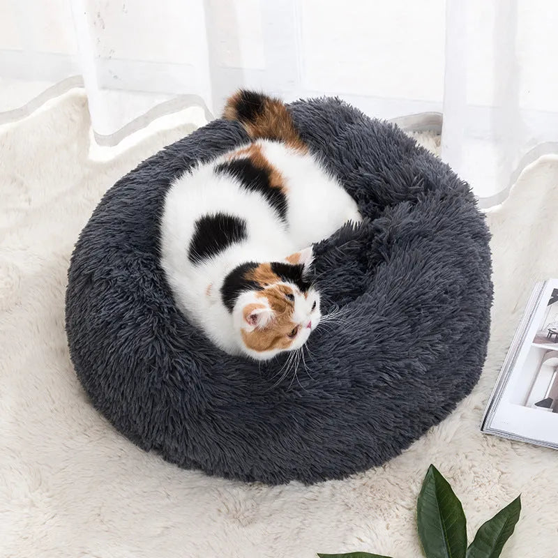Round cloth cat bed in winter warm design, available in 30cm to 100cm diameters and six colours.