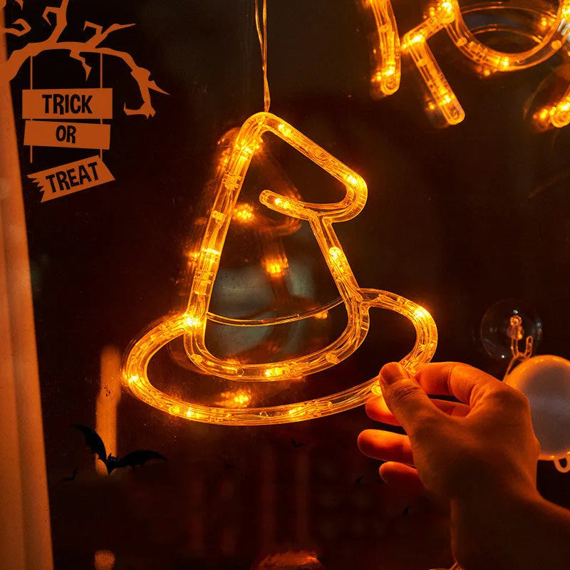 Halloween window hanging LED lights set with seven battery-powered horror-themed decorative pieces
