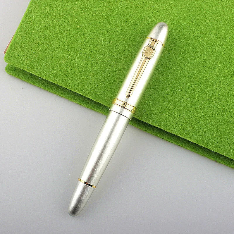 Metal ball pen with pearl round beads and black gold clip on white background