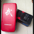 Red martial arts boxing kick target pad with hand-sewn construction for combat training
