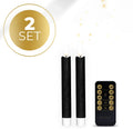 Set of four black flameless LED taper candles with realistic 3D flickering flames.