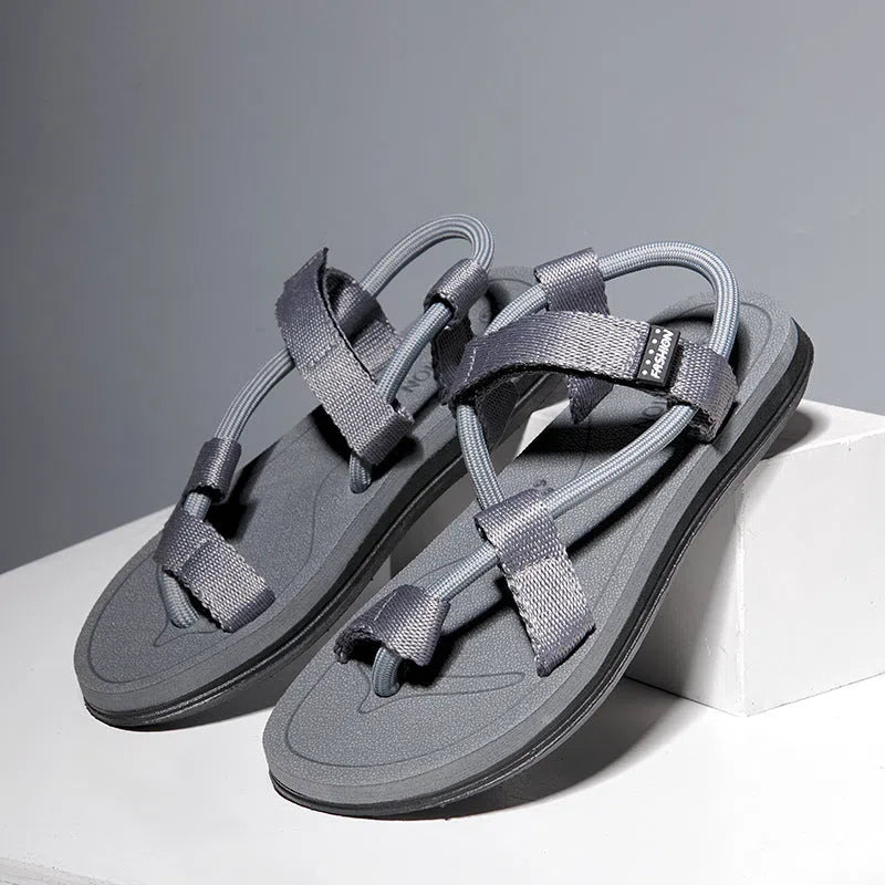 Men's breathable canvas open-toe beach slippers with Velcro strap in black, brown, and gray