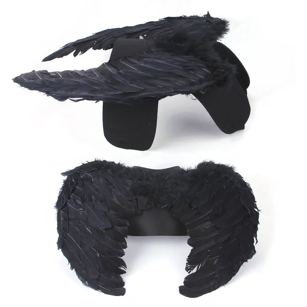 Black and white angel wings dog costume with chest-back harness design for Halloween