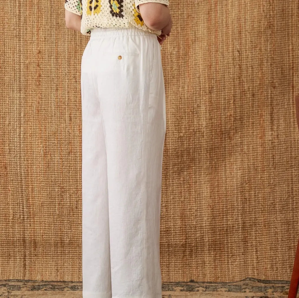 Women's linen high-waist trousers with elastic waistband and straight-leg lace detailing in navy blue