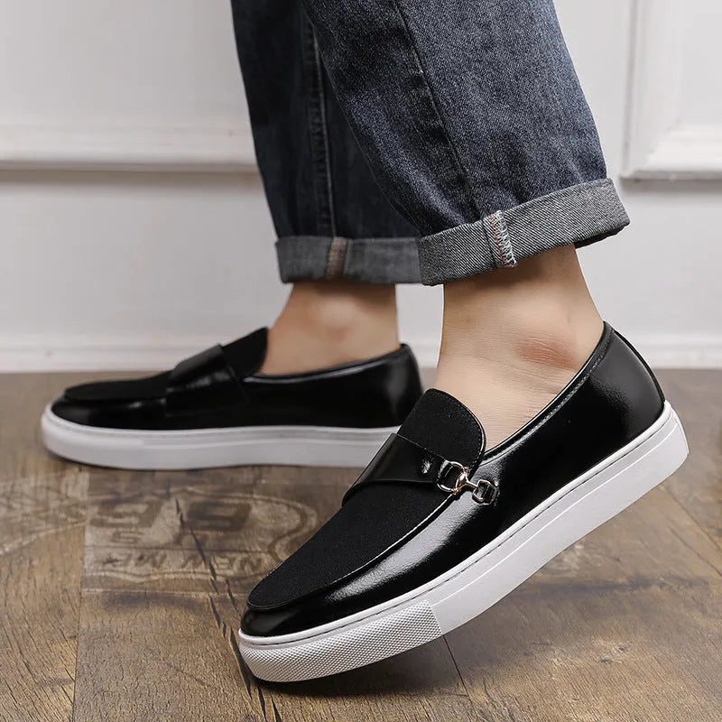 Men's black slip-on shoes with gold horsebit buckle and round toe stitching design