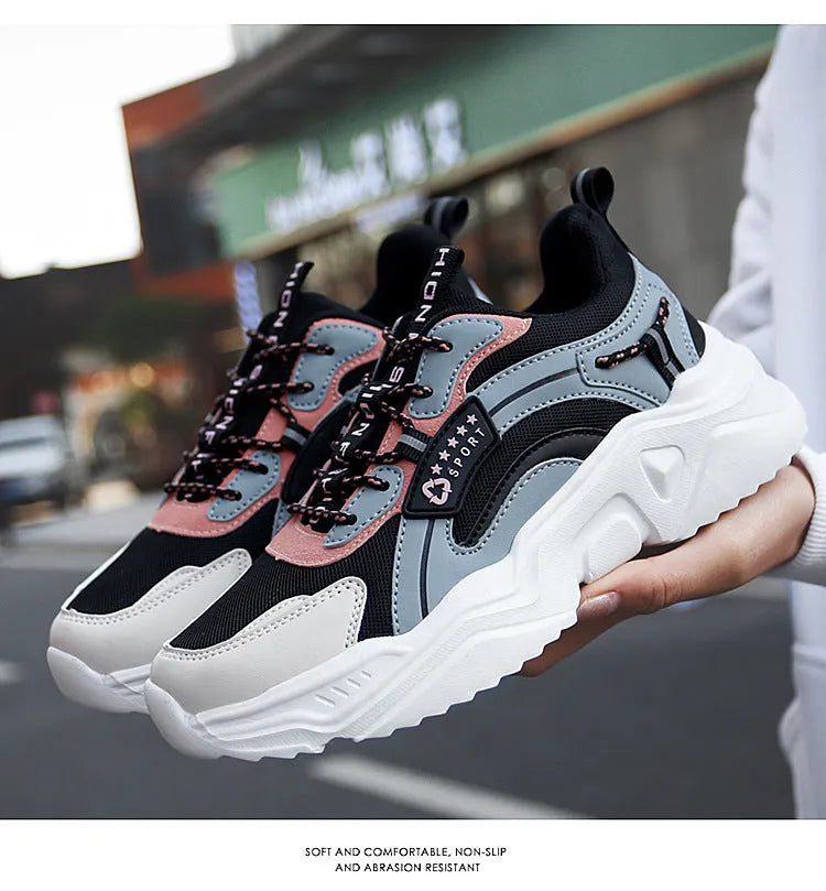 Women's white casual mesh sports shoes with round toe, buckle detail, and a thick PU sole.